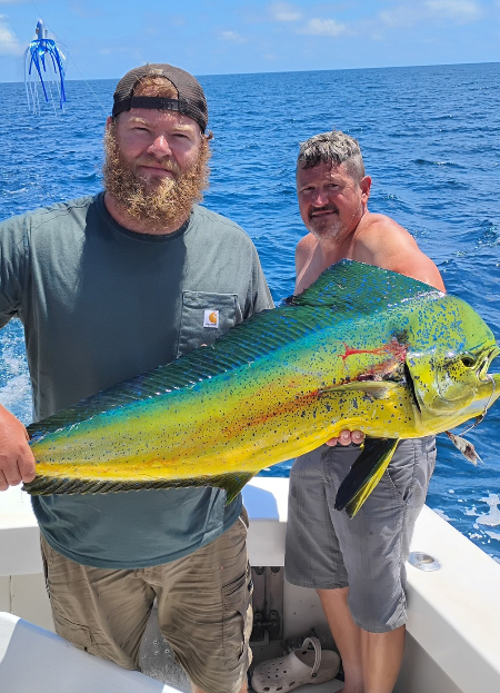 Ocean City angler holding a large mahi.